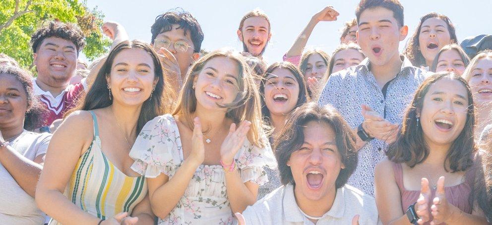 excited students on a sunny day